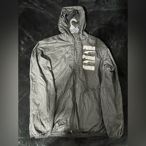 large grey puma windbreaker